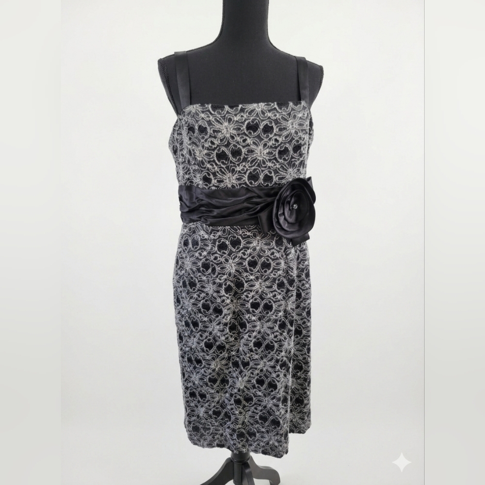 Black and White Strapless Lace-Overlay Cocktail Dress with Sash Flower